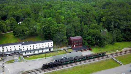 Overall aerial view of Cass State Park in West Virginia, WV, with the Shay engine at the station and loaded with tourists for the steam train ride to the top of the mountain. photo