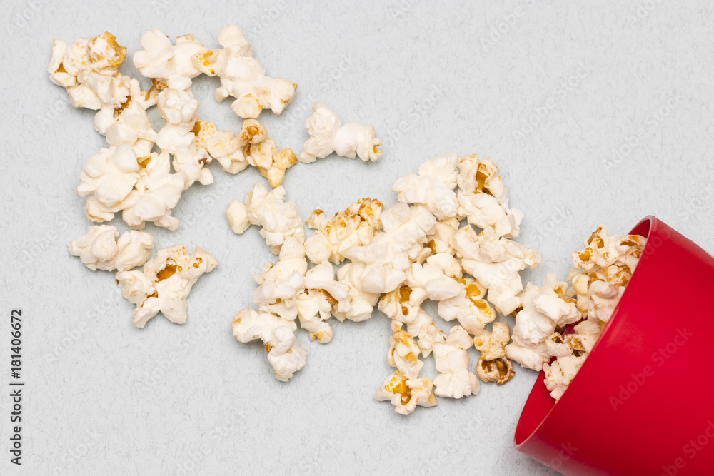 paper cup with popcorn on blue background. mock up. top view paper cup with popcorn on blue background. mock up. top view