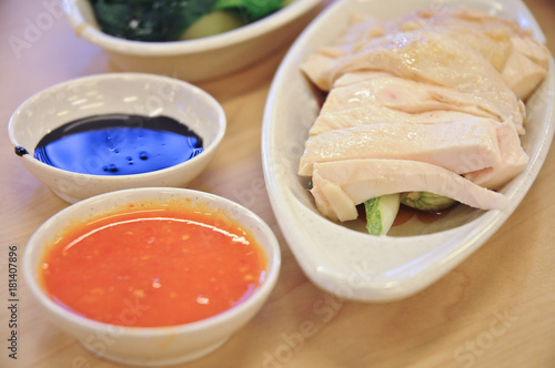 Принти на полотні Delicious legendary Singaporean Hainanese chicken rice with two