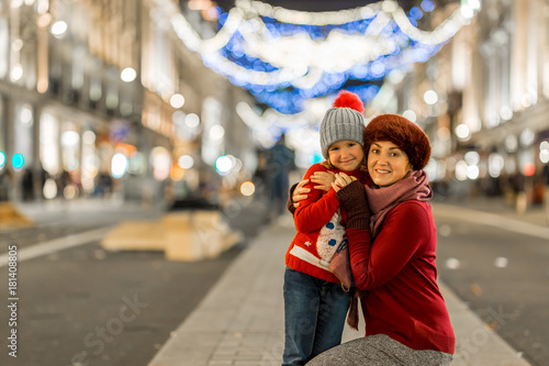 Sticker Happy family on Regent's street in Christmas time, London