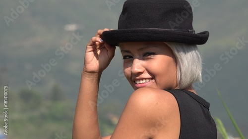 Flirty Sexy And Attractive Young Woman With Hat