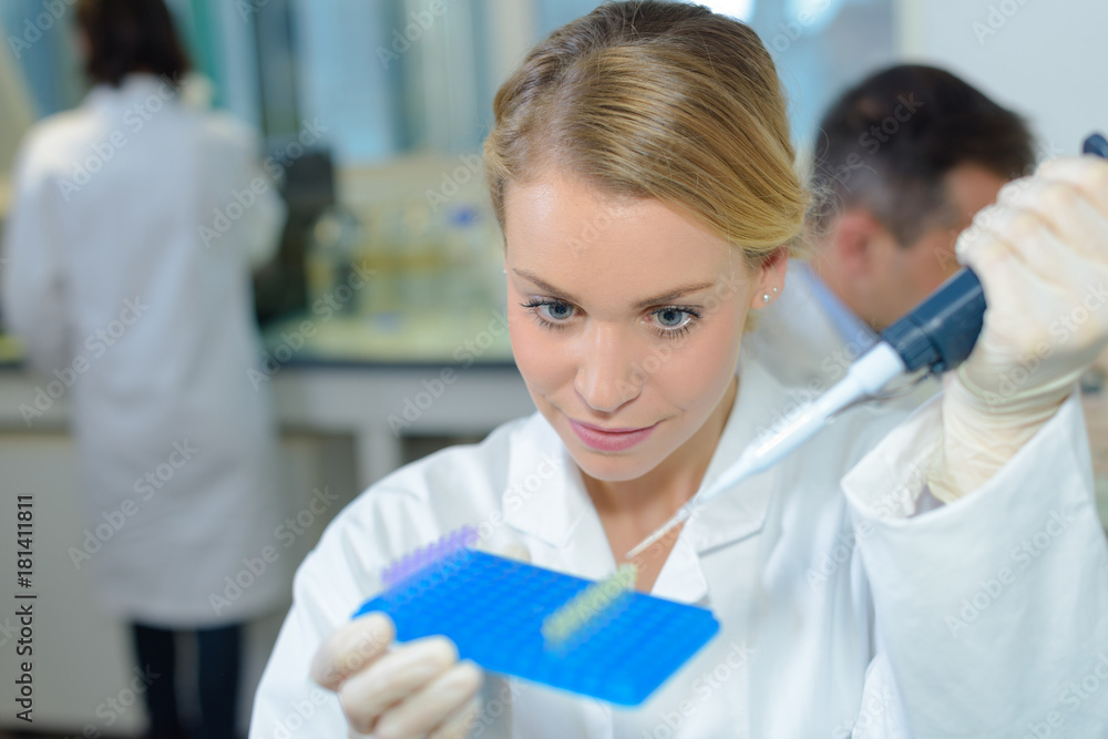 scientist performing analysis scientist performing analysis