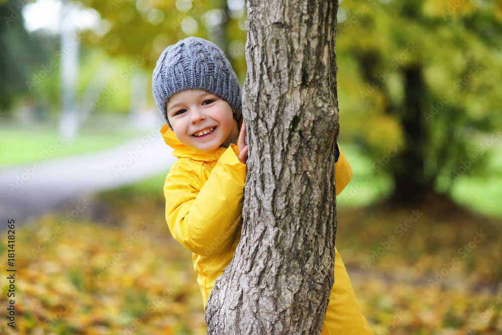 Children in the autumn park walk Children in the autumn park walk