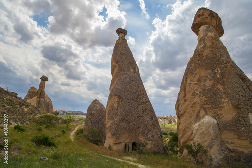 Love valley in Goreme village, Turkey. Rural Cappadocia landscape. Stone houses in Goreme, Cappadocia. Countryside lifestyle photo