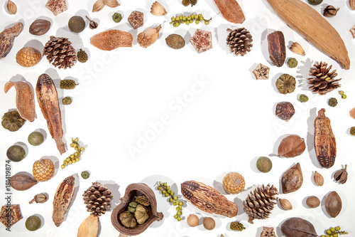 Traditional Christmas card border image. Pinecone berries nuts frame on white background