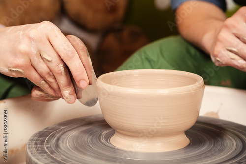 Close-up of a  woman potter sclulpt clay