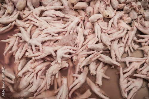 Quadro em tela Collection of chicken legs, fresh raw chicken legs, thai market, carnage concept