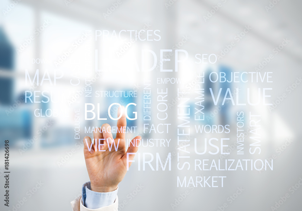 Concept of modern business with palm choocing on of keywords for success Concept of modern business with palm choocing on of keywords for success