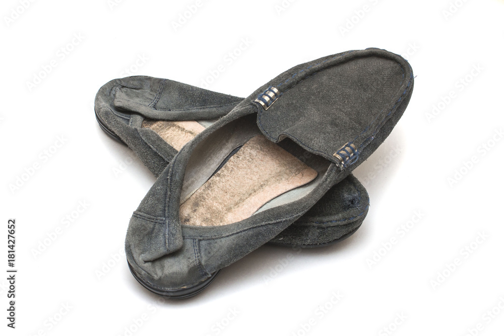 worn out female shoes on white isolated background worn out female shoes on white isolated background