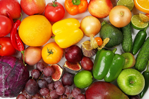 Many different fruits and vegetables on light background  closeup