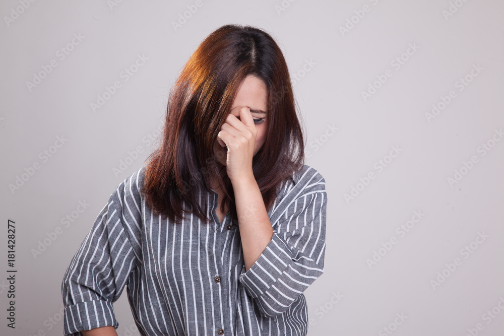 Young Asian woman got sick and headache. Young Asian woman got sick and headache.