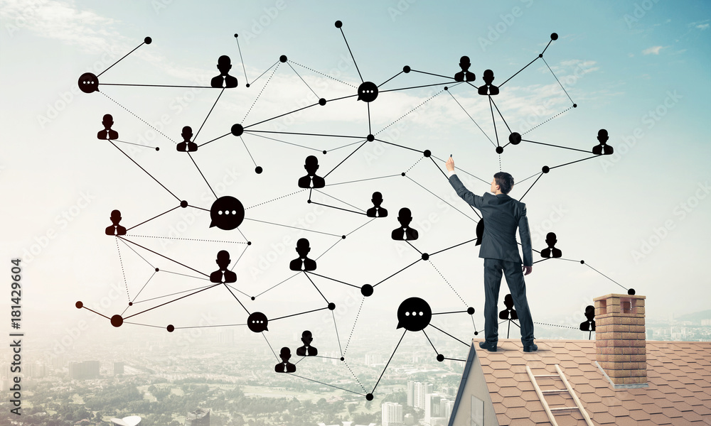 Businessman on house roof presenting networking and connection c Businessman on house roof presenting networking and connection c