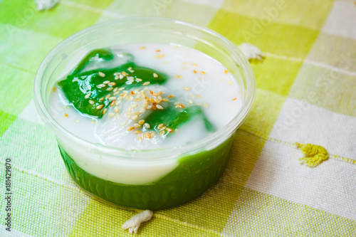 Black coconut sweet pudding, Kanom piakpoon. photo