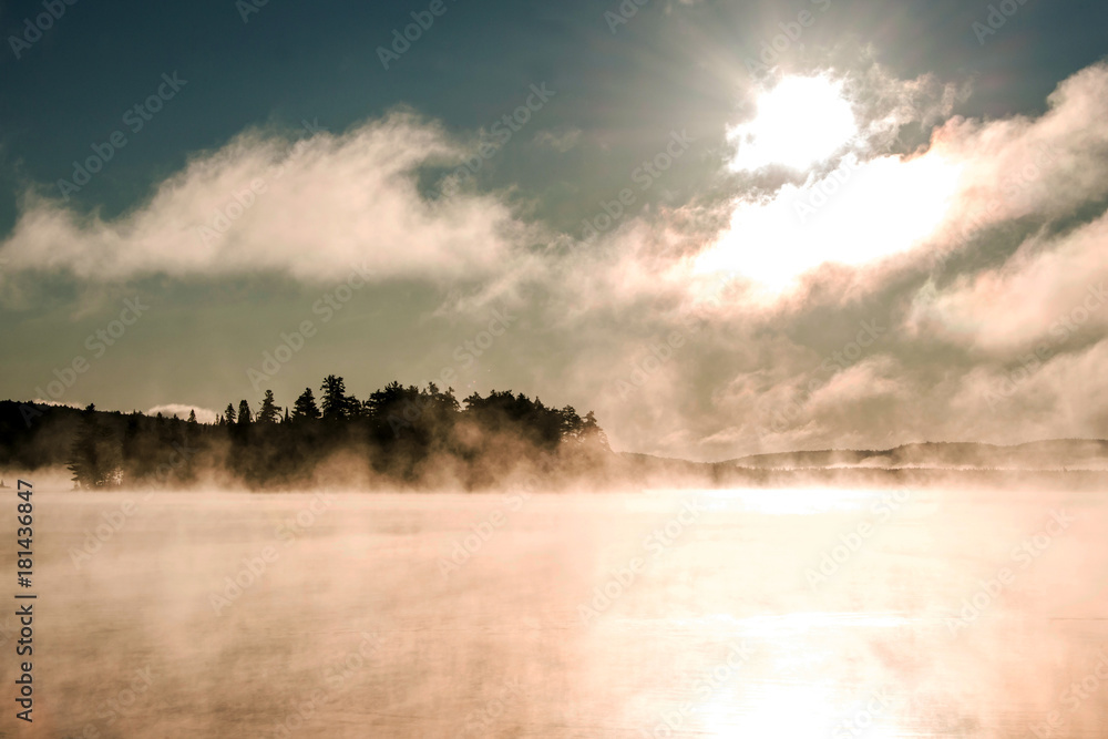 Lake of two rivers algonquin national park ontario canada sunset sunrise with fog foggy mystical atmosphere background Lake of two rivers algonquin national park ontario canada sunset sunrise with fog foggy mystical atmosphere background