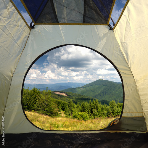 View from inside a tent on mountains landscape