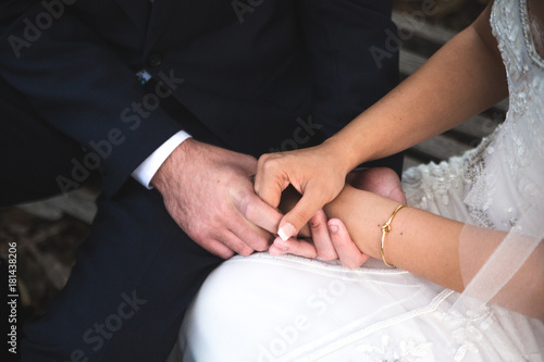 Bride and Groom Holding Hands