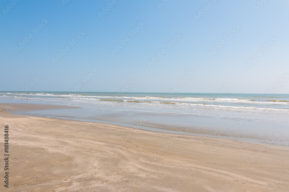 Clean sandy beach with blue ocean and clear sky. Galveston Island, Texas, Houston.