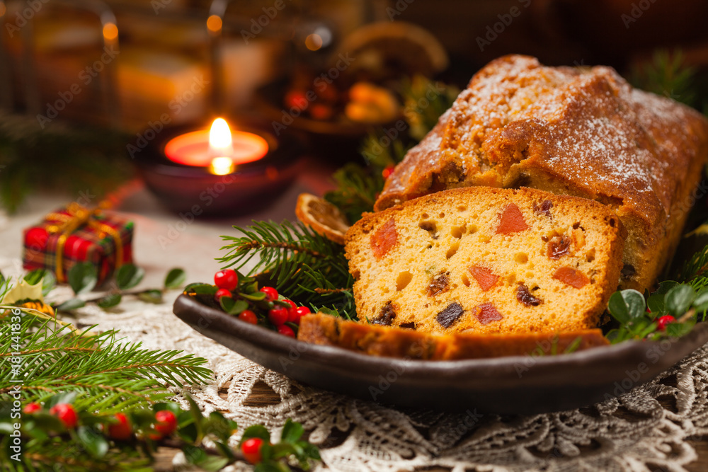 Christmas fruitcake. Natural wooden background. Christmas fruitcake. Natural wooden background.
