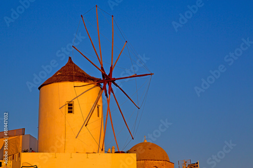 old mill in santorini greece europe  and the sky sunrise photo