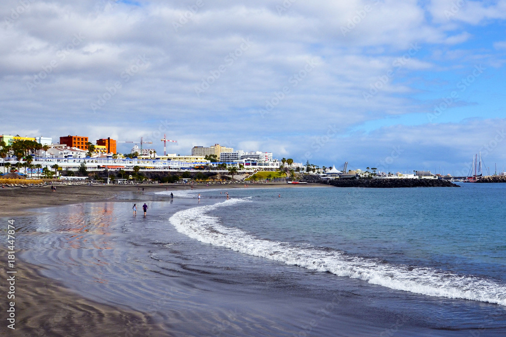 View on Torviscas beach in south Tenerife,Canary Islands,Spain.Playa de Torviscas.Travel or vacation concept.Selective focus.
