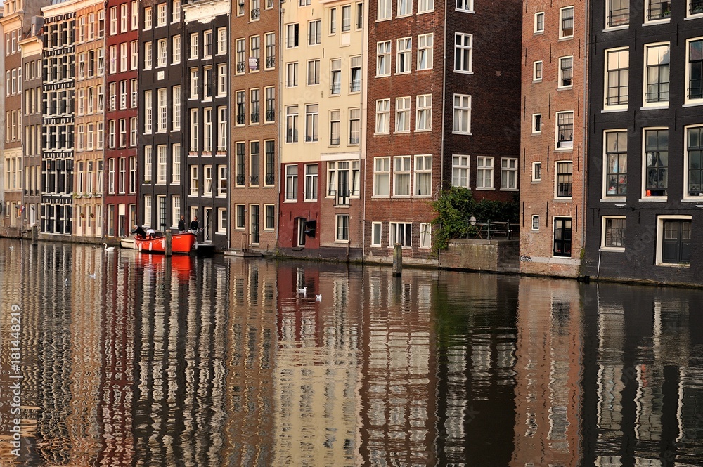 Naklejka premium Boat in the canals of Amsterdam