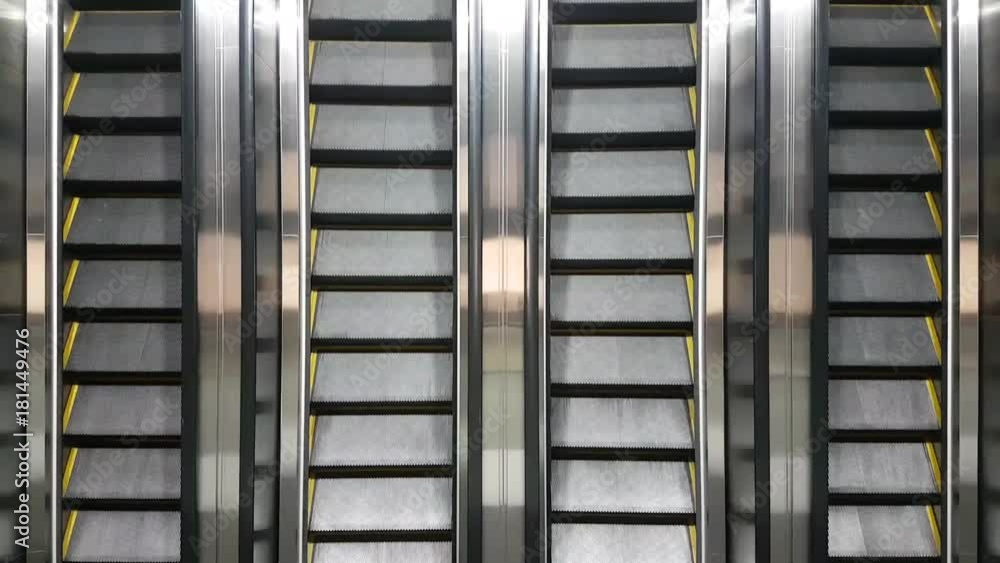 four escalators are moving.