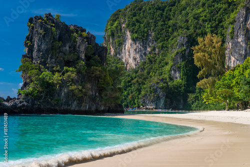 urquoise water and sandy beach, high cliffs in a beautiful place in Thailand - Hong Island