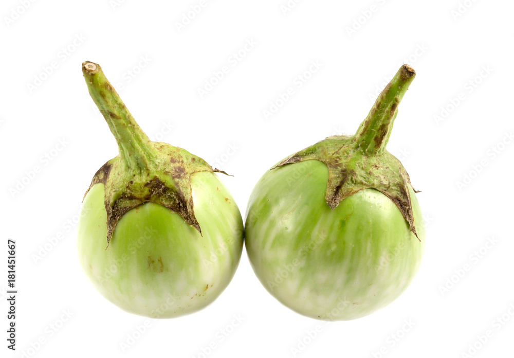 fresh organic green eggplant with drops of water on white background. fresh organic green eggplant with drops of water on white background.