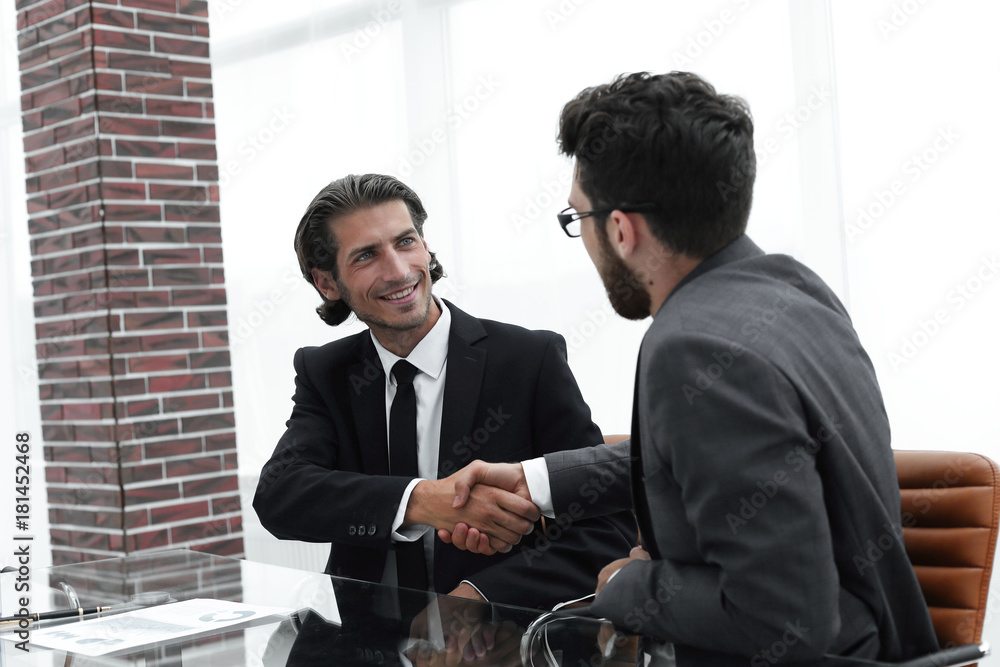 handshake reliable partners in the office. handshake reliable partners in the office.