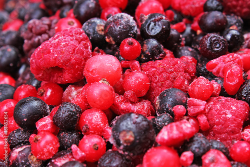 Frozen mixed berries berry as background. Blueberries,raspberries black berri...
