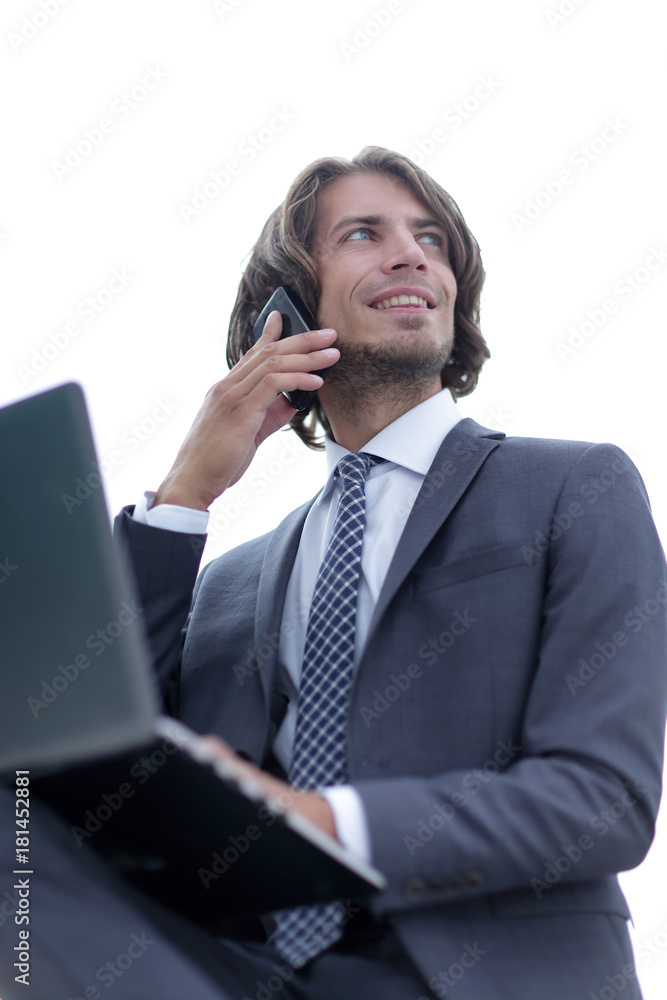 closeup.successful businessman talking on the phone closeup.successful businessman talking on the phone