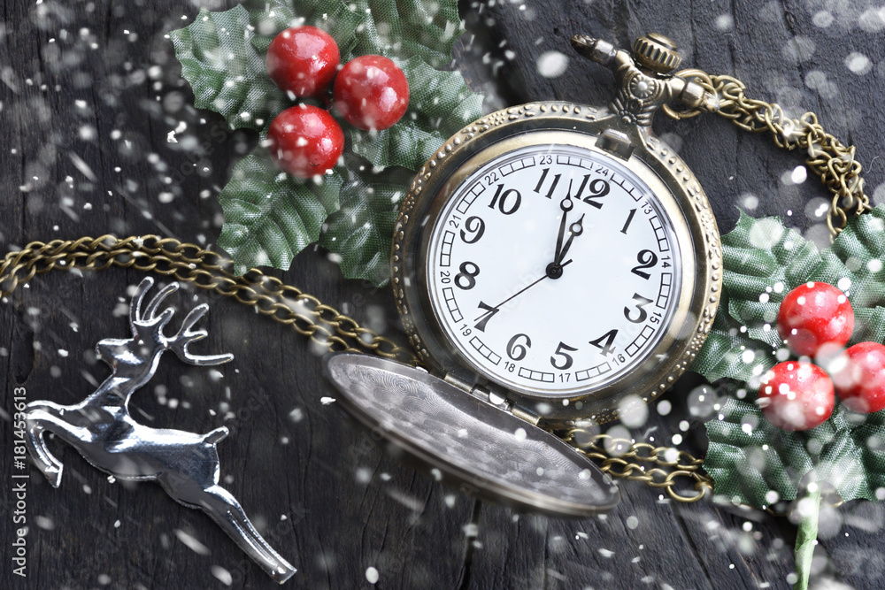 Christmas clock with winter decoration on snow. Happy new year concept. Christmas clock with winter decoration on snow. Happy new year concept.