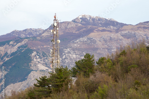 antenna with plates in  forest on  mountain background