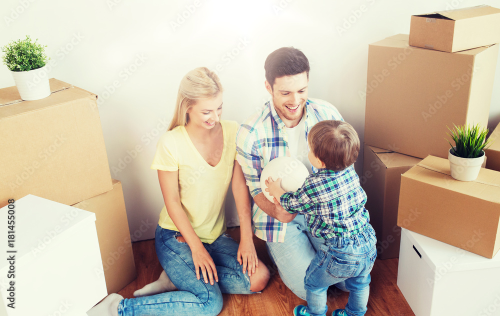 happy family moving to new home and playing ball happy family moving to new home and playing ball