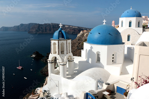 Blurred image of the famous 3 Blue Domes at Santorini