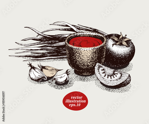 Ketchup in bowl and tomatoes isolated on white
