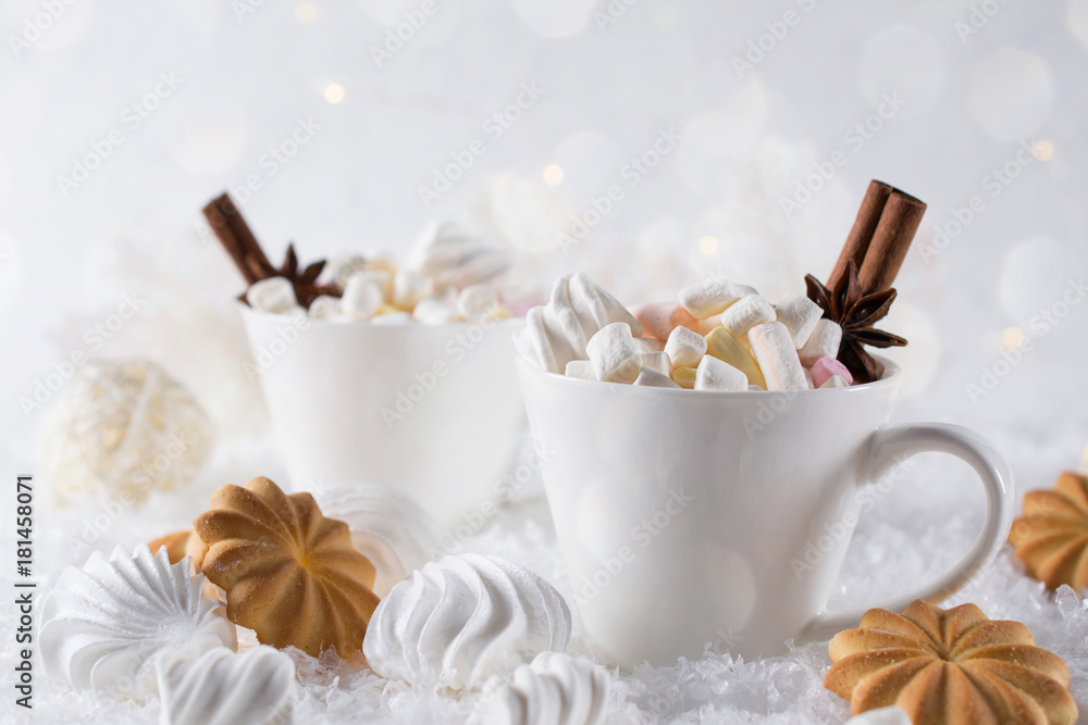 Holiday cup of  cocoa with marshmallow or coffee with spice and home cookies. Christmas background.
