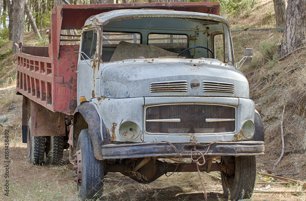 Old vintage truck in the wood on the island Rhodes (Greece)