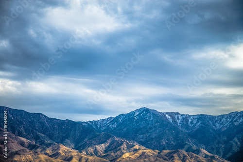 Beautiful Blue rocky canyon mountain landscape with cloudy sky