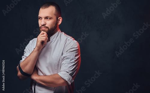 Portrait of bearded chef cook.