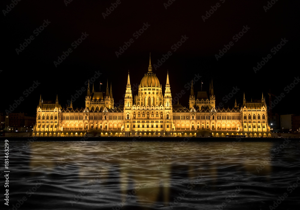Fototapeta premium Night view of the Hungarian Parliament in Budapest, Hungary.
