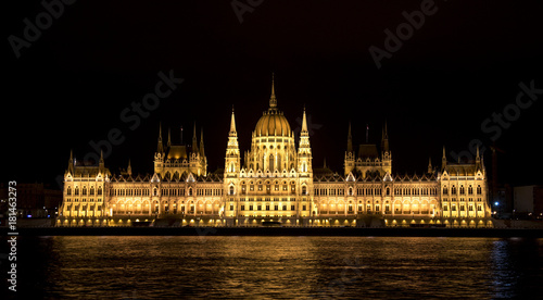 Night view of the Hungarian Parliament in Budapest, Hungary.