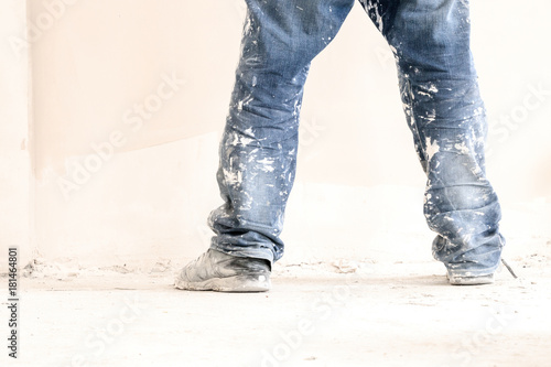 Construction worker with jeans and street shoes