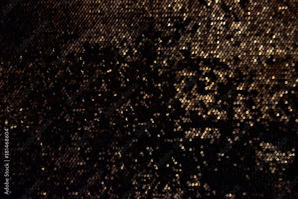 Background texture, pattern. Black and gold Cloth paillettes. Look at these Neon black and red Paillette Sequins. Ideal for events, celebrations and christmas Background texture, pattern. Black and gold Cloth paillettes. Look at these Neon black and red Paillette Sequins. Ideal for events, celebrations and christmas