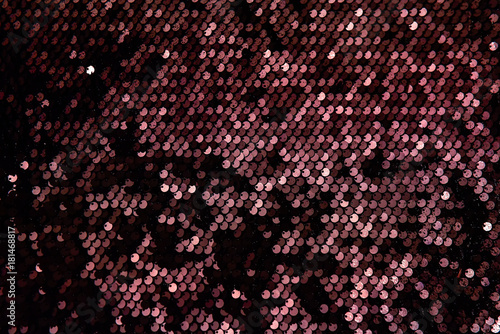 Background texture, pattern. Black and red Cloth paillettes. Look at these Neon black and red Paillette Sequins. Ideal for events, celebrations and christmas photo