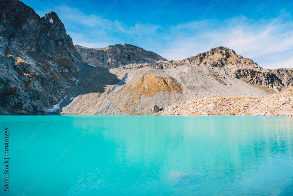 Mountain lake with turquoise water and rocks, Russia Mountain lake with turquoise water and rocks, Russia