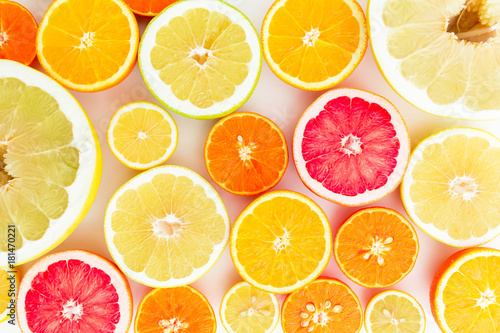 Citrus fruit pattern of lemon, orange, grapefruit, sweetie and pomelo. Fruit background. Flat lay, top view.