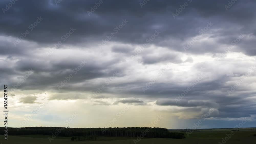 Rain clouds, a dramatic sky, time-lapse 4K.
Rain clouds, a dramatic sky, time-lapse 4K.