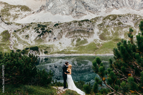 Wedding couple near the dragon lake 