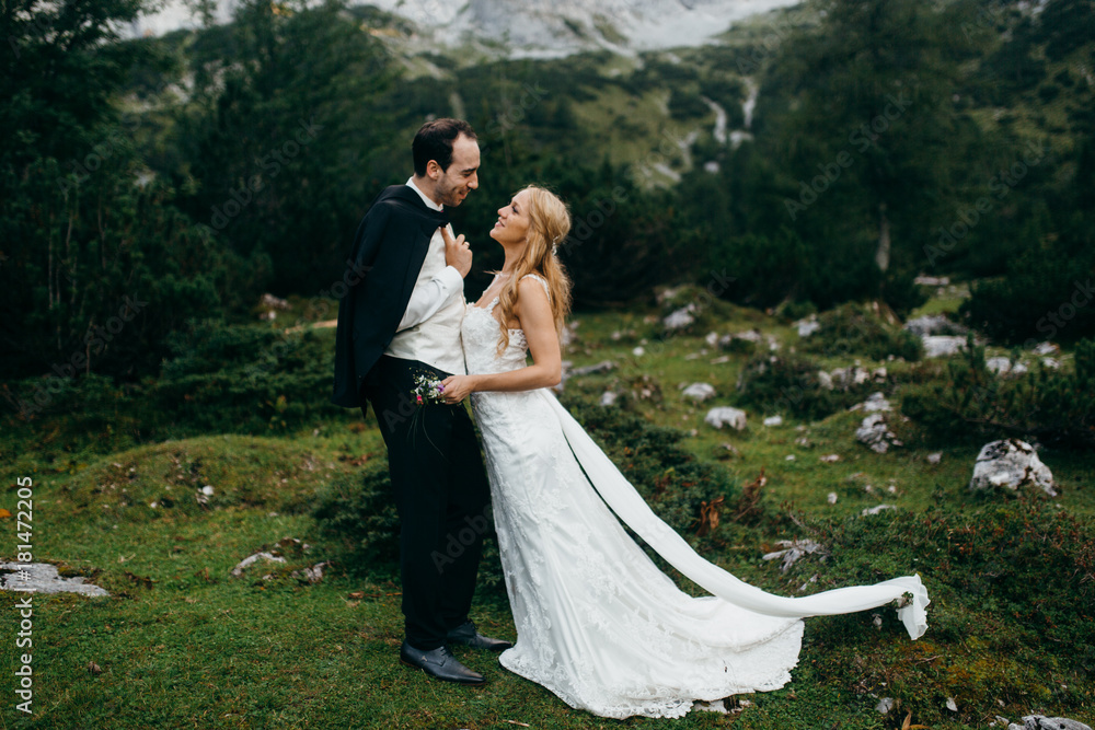 Wonderful wedding couple at the summer 